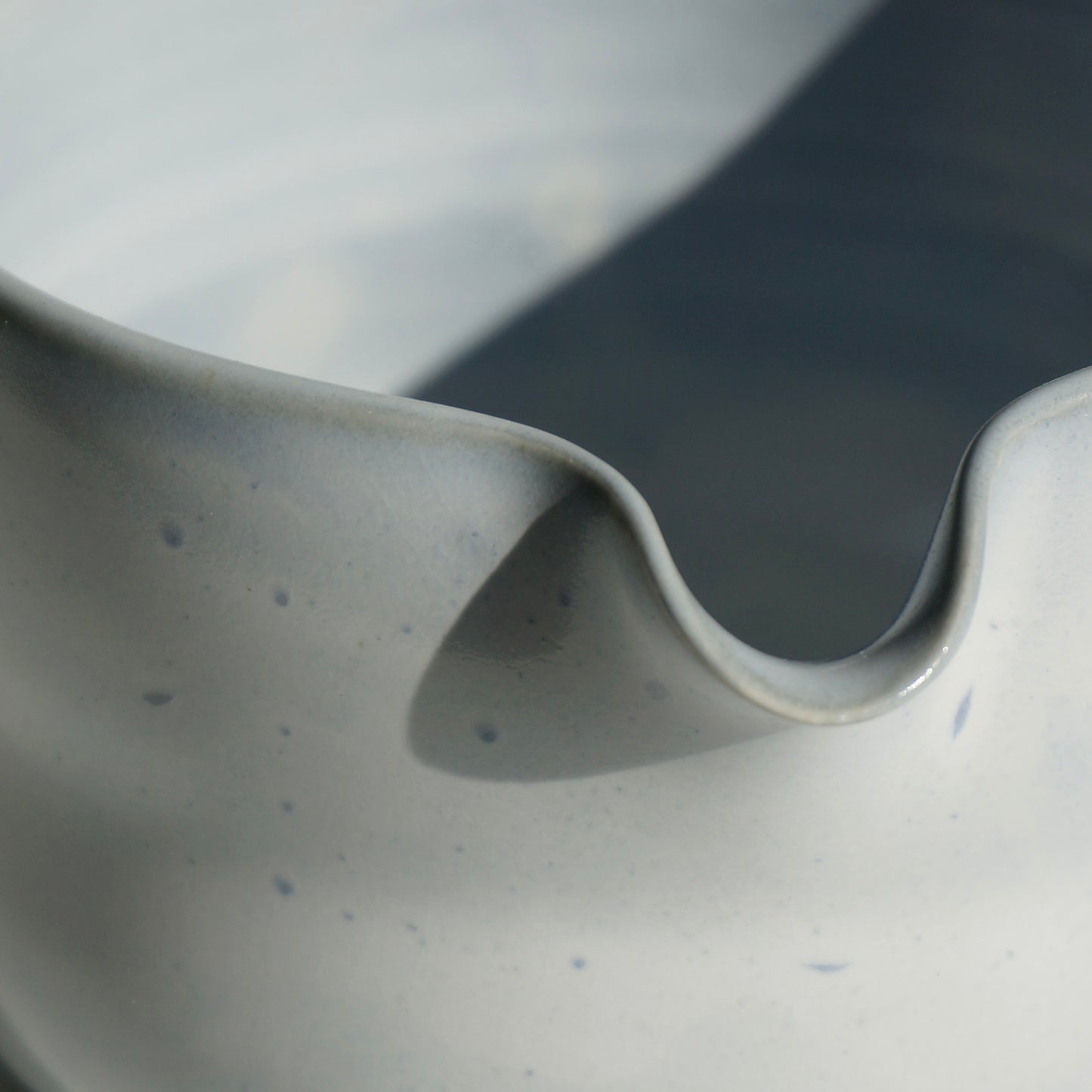 handmade ceramic spouted matcha bowl in light blue glaze by Kongji Pottery