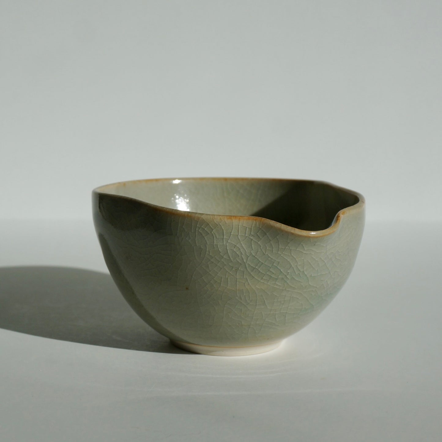 handmade ceramic coffee tea dosing cup in celadon glaze by Kongji Pottery