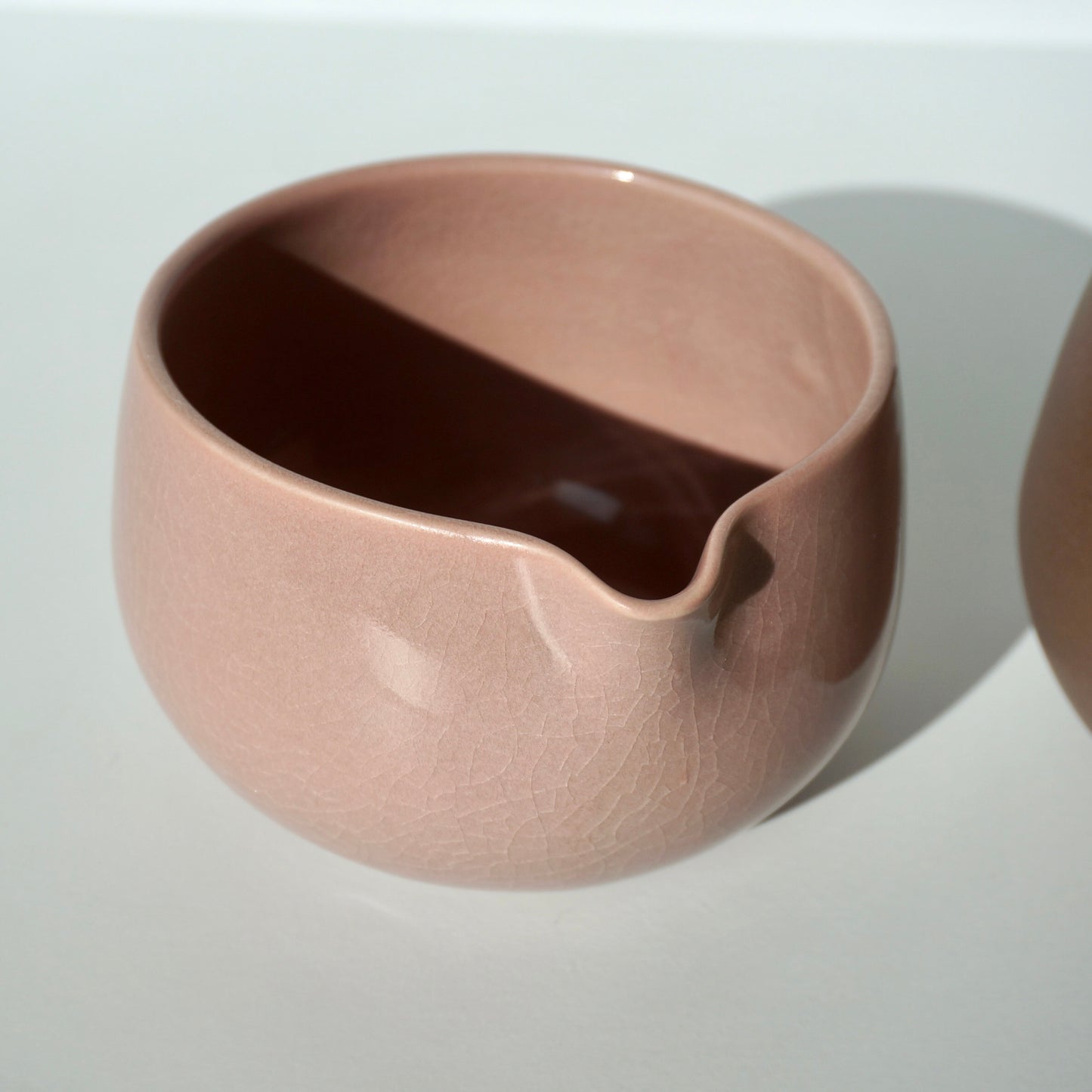 handmade ceramic crackled pink spouted matcha bowl by Kongji Pottery