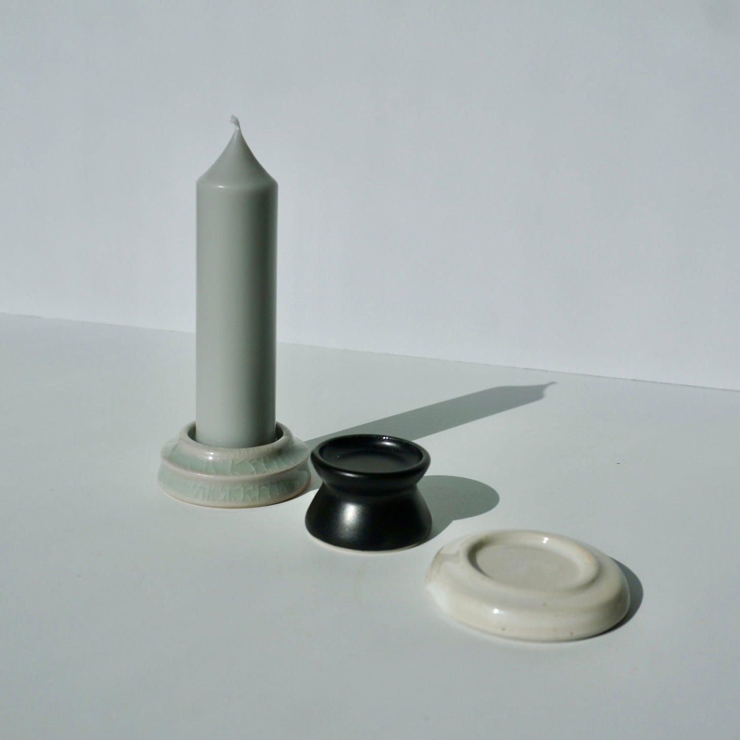 Handmade ceramic candle holders by Kongji Pottery