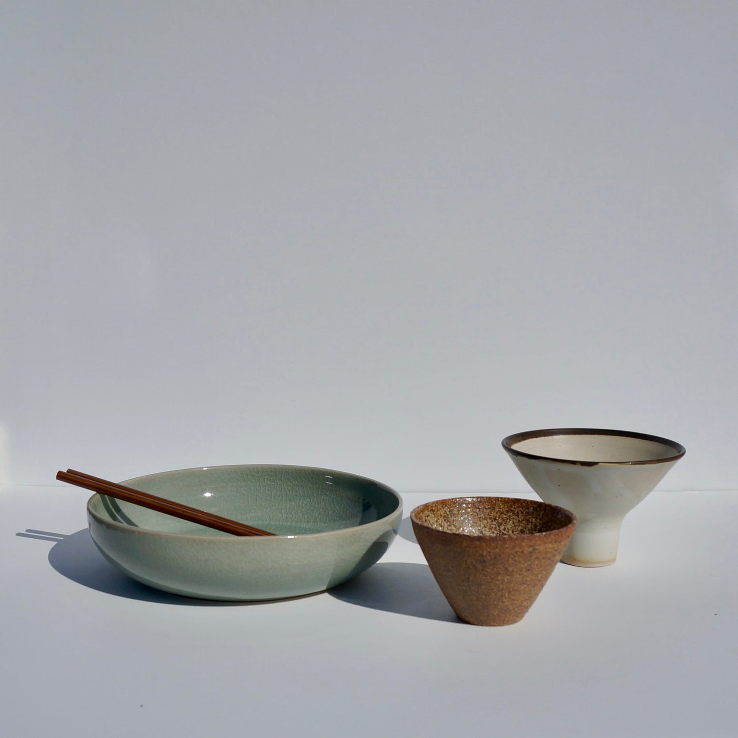 Handmade ceramic plates and bowls by Kongji Pottery