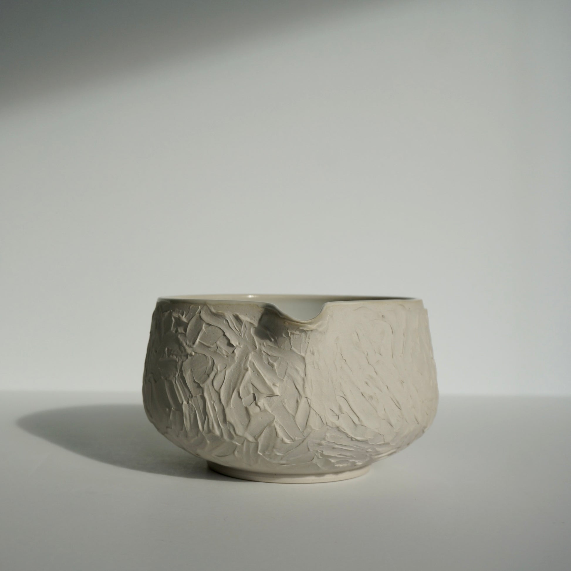handmade ceramic textured white matcha bowl by Kongji Pottery