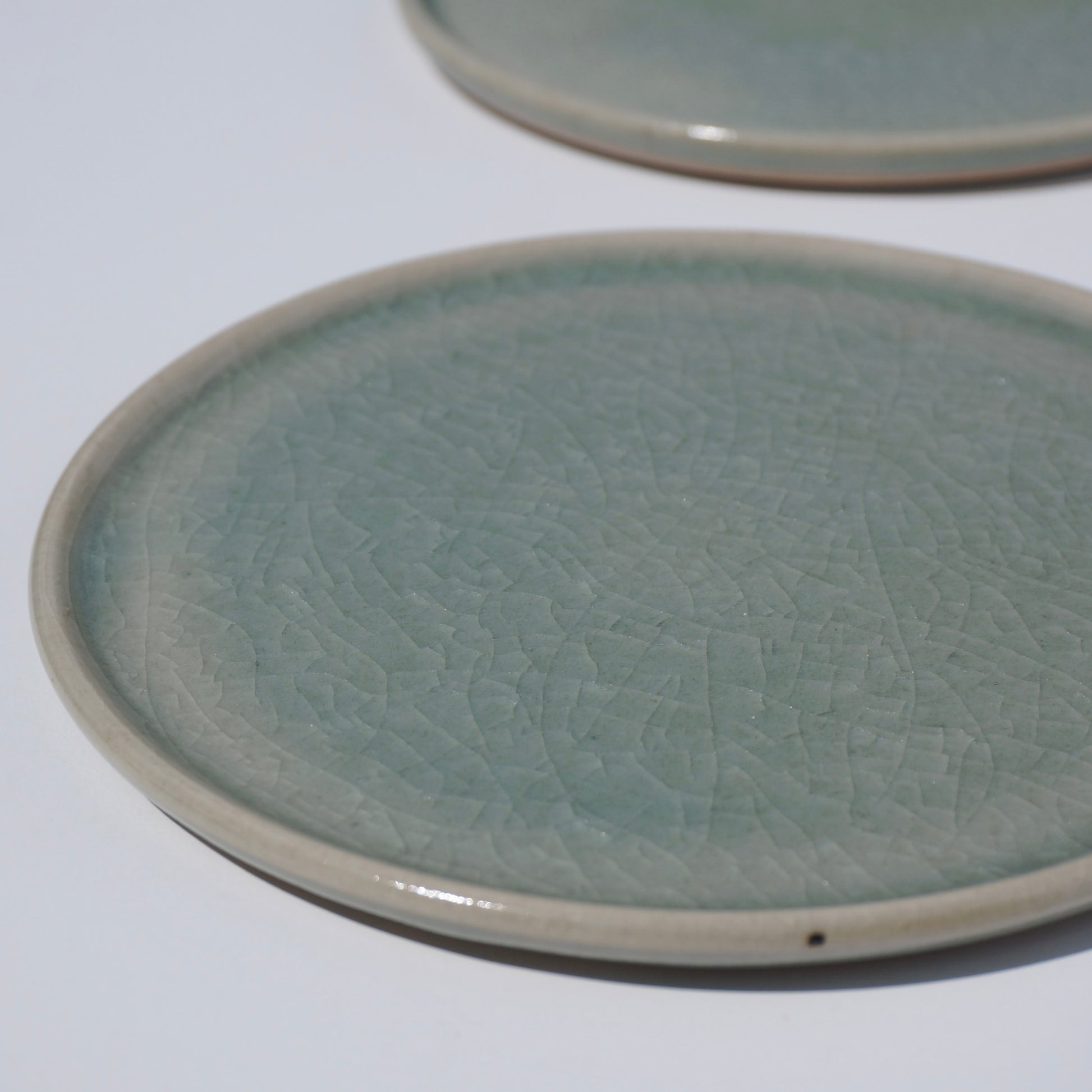 Handmade ceramic dessert plate with crackled celadon glaze by Kongji Pottery