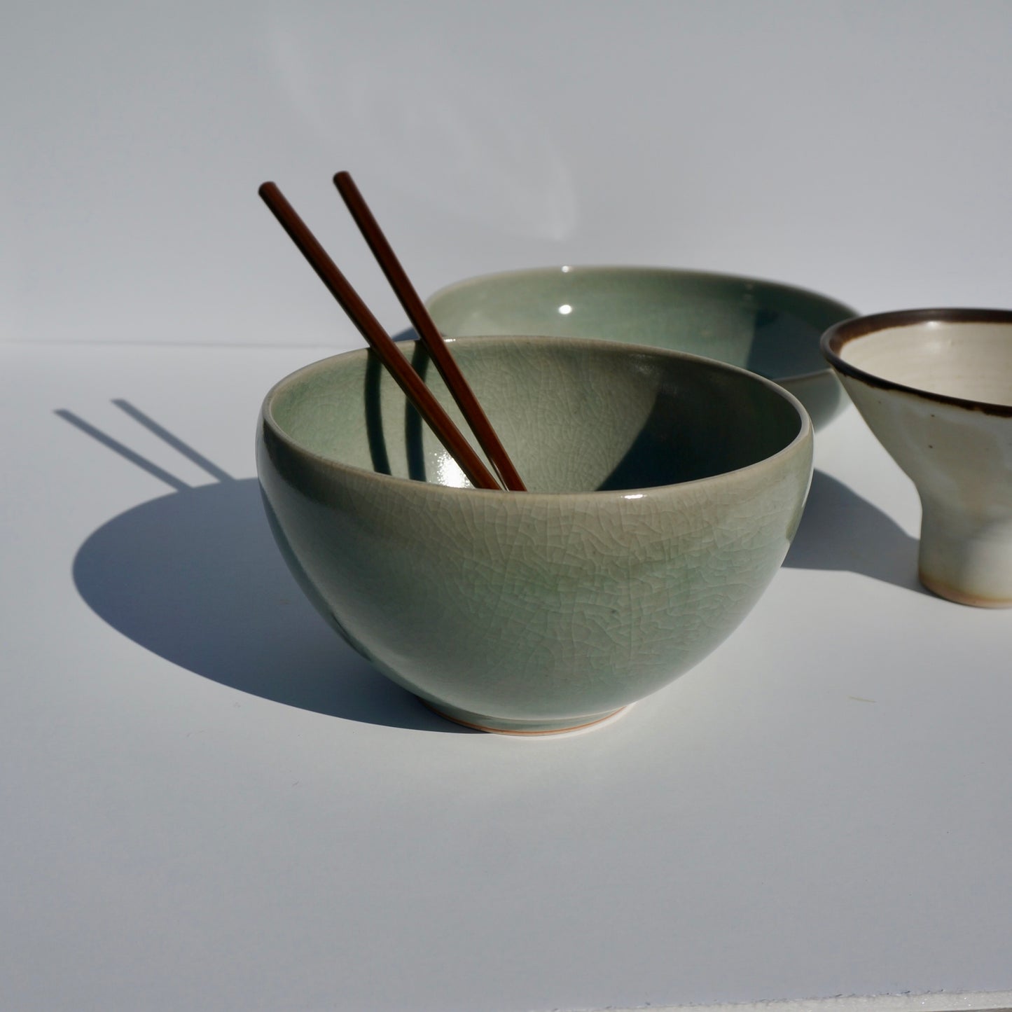 Handmade ceramic ramen bowl in crackled celadon glaze by Kongji Pottery