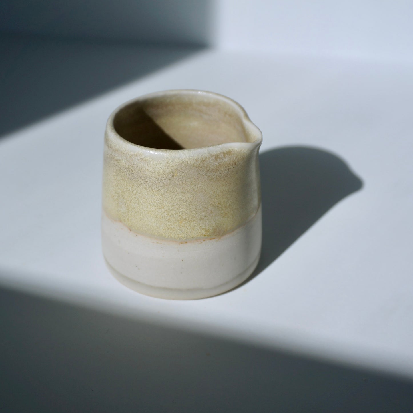 Handmade ceramic mini spouted pitcher by Kongji Pottery