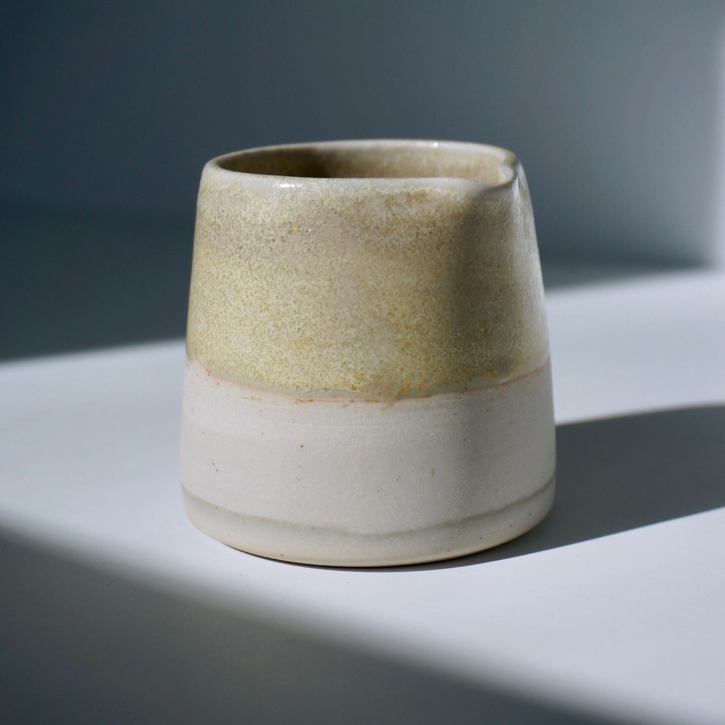 Handmade ceramic mini spouted pitcher by Kongji Pottery