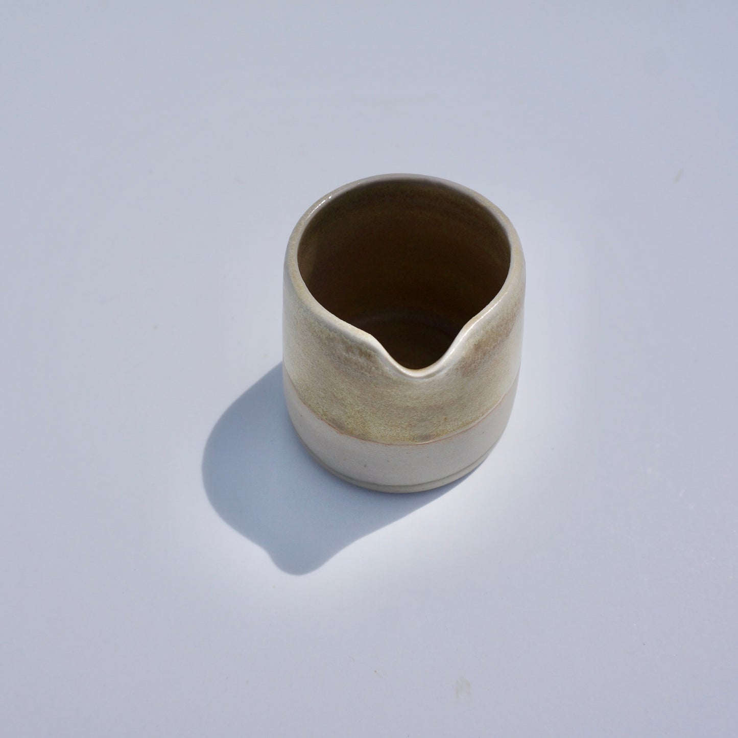 Handmade ceramic mini spouted pitcher by Kongji Pottery