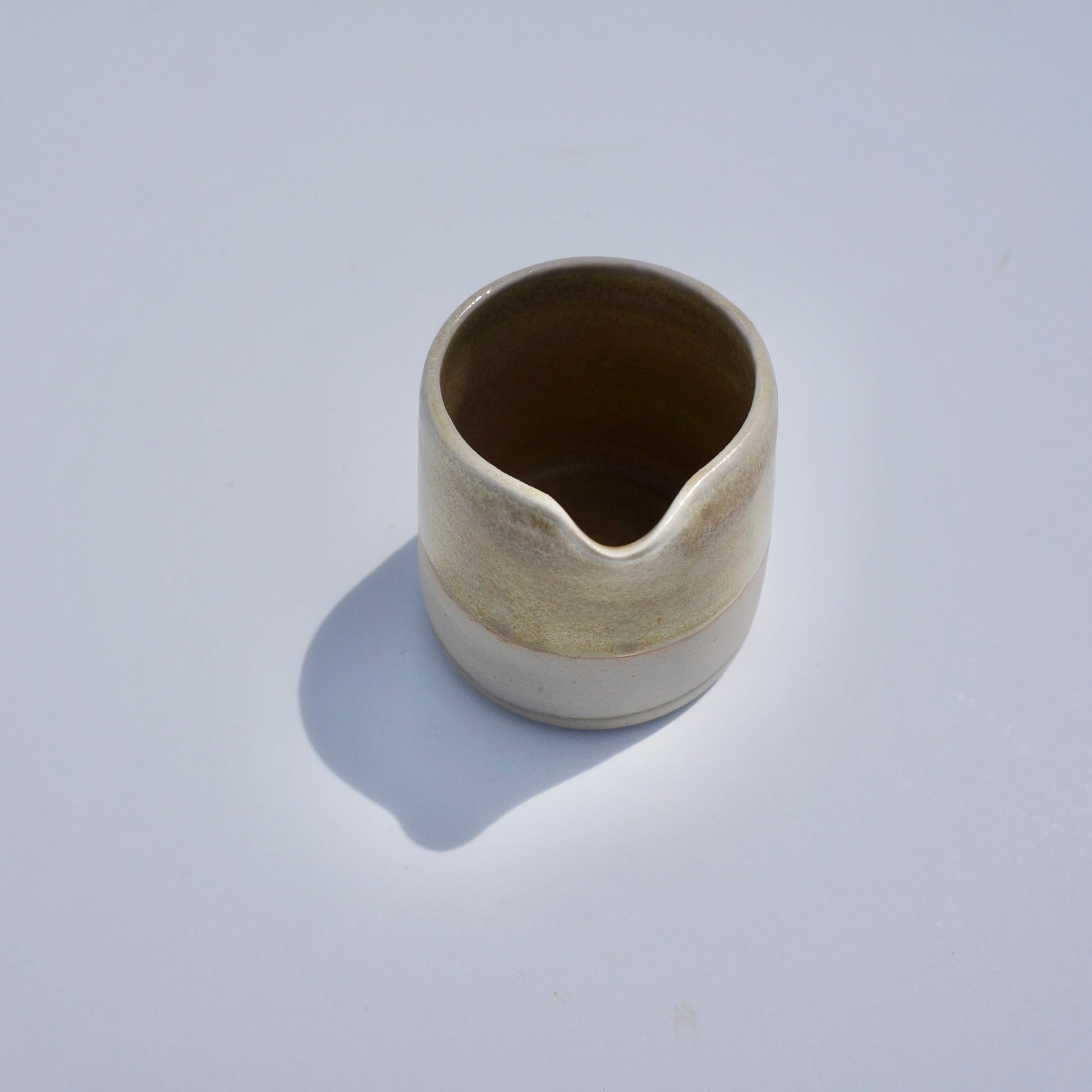 Handmade ceramic mini spouted pitcher by Kongji Pottery