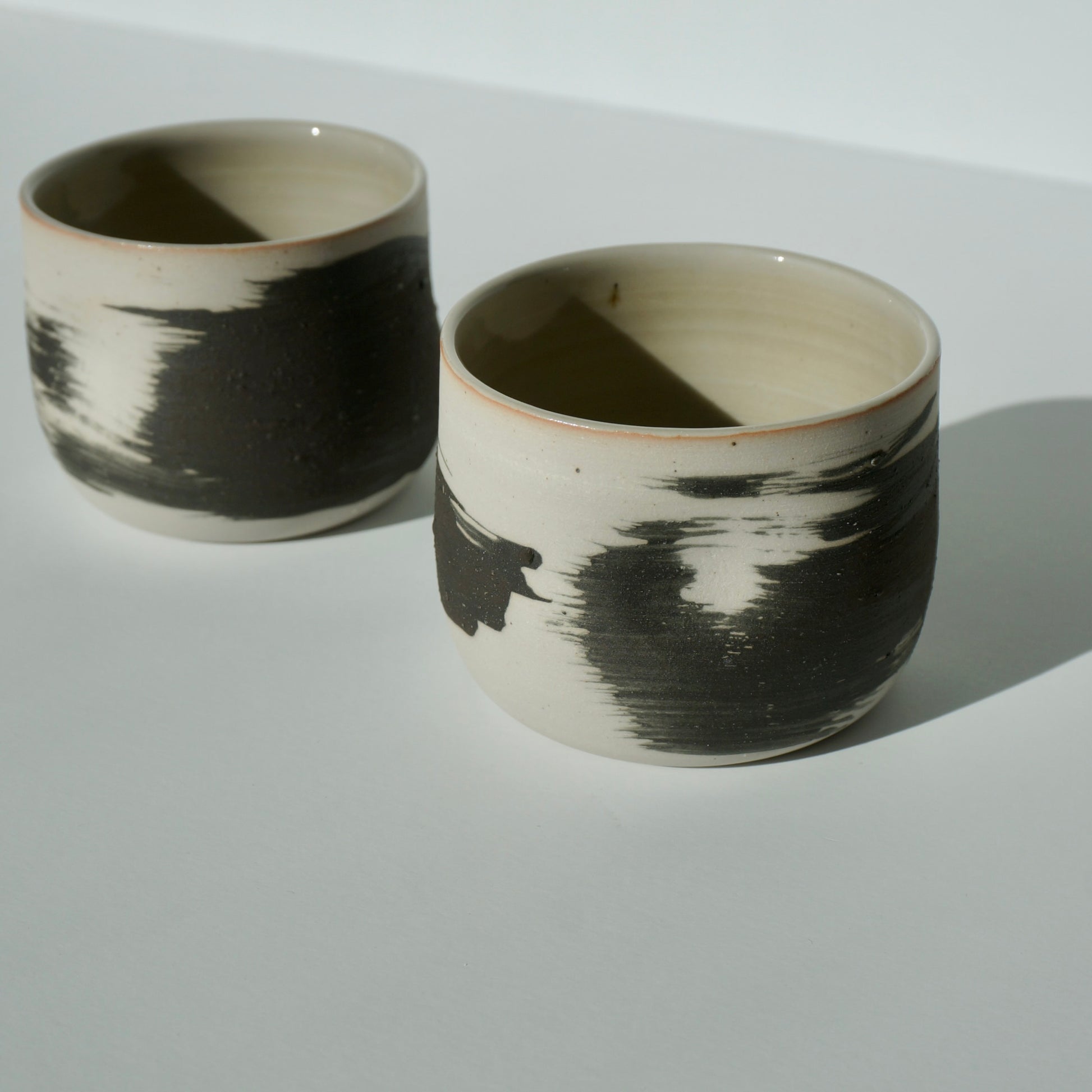 handmade ceramic dimple pinch cups by Kongji Pottery