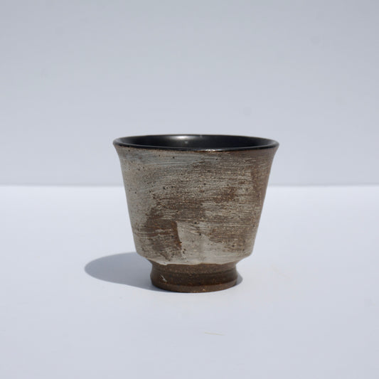 Handmade ceramic teacup by Kongji Pottery