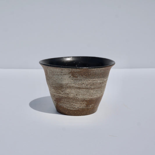 Handmade ceramic teacup by Kongji Pottery