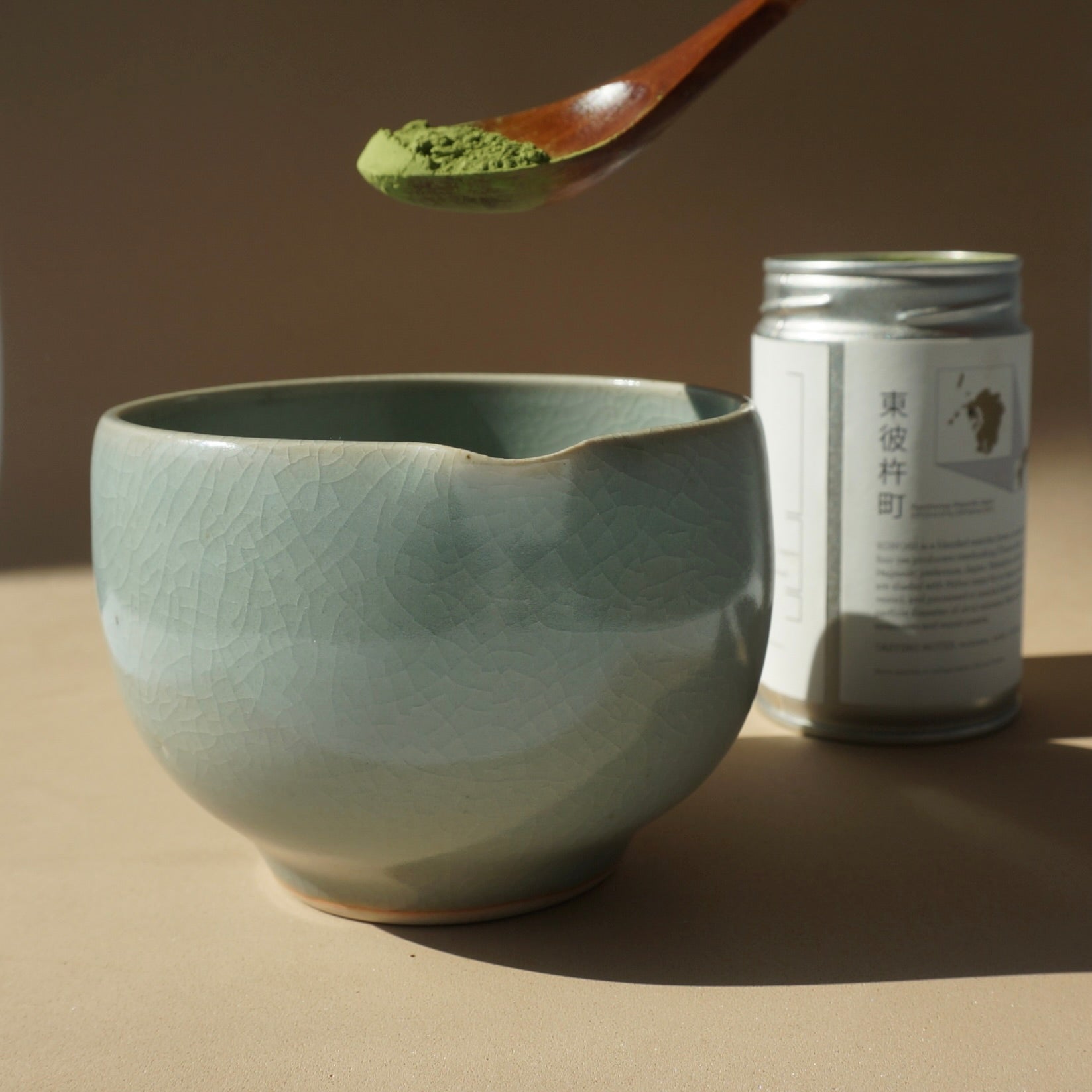 Handmade ceramic spouted matcha bowl in crackled celadon glaze by Kongji Pottery