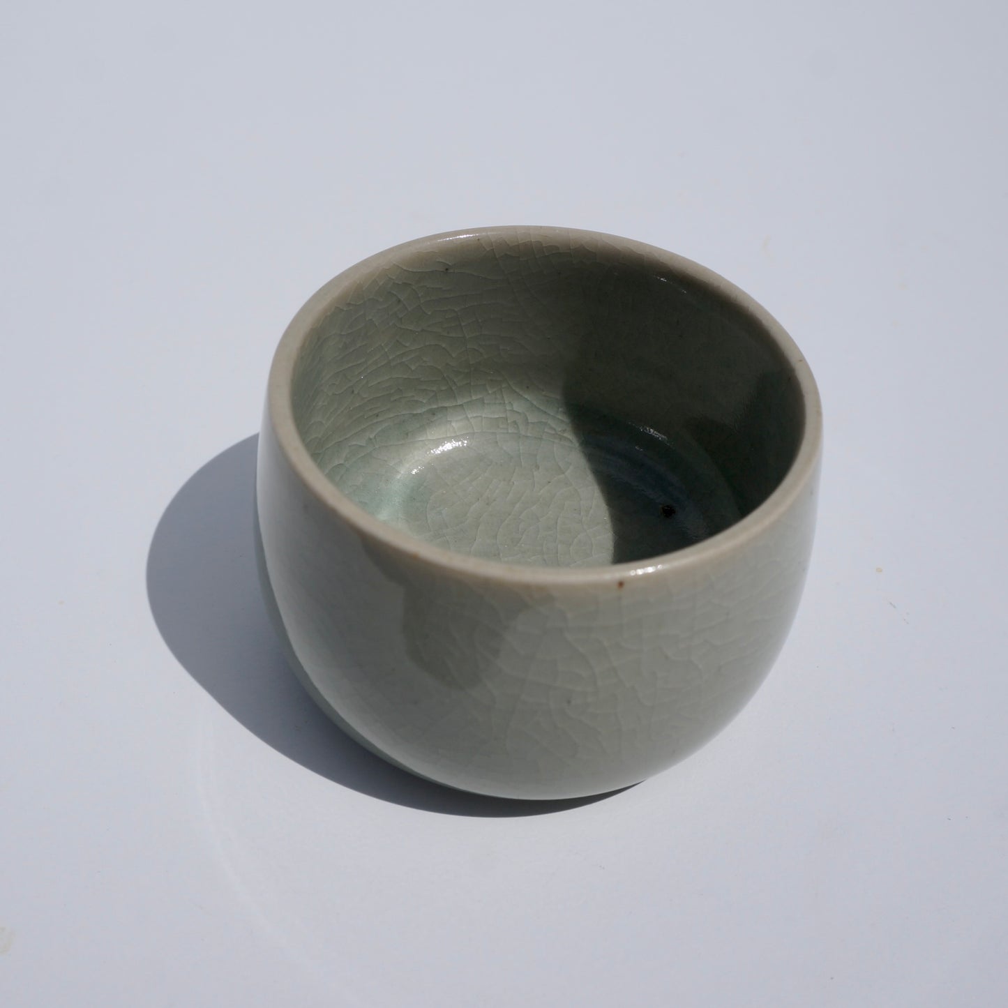 handmade ceramic tea/espresso cup in crackled celadon glaze by Kongji Pottery