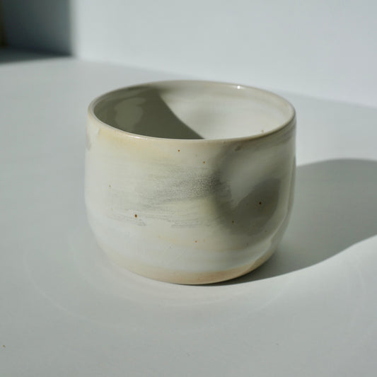 handmade ceramic dimple cup in pearlescent glaze by Kongji Pottery