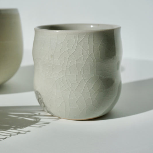 handmade ceramic bubble teacup in crackled glacier glaze by Kongji Pottery