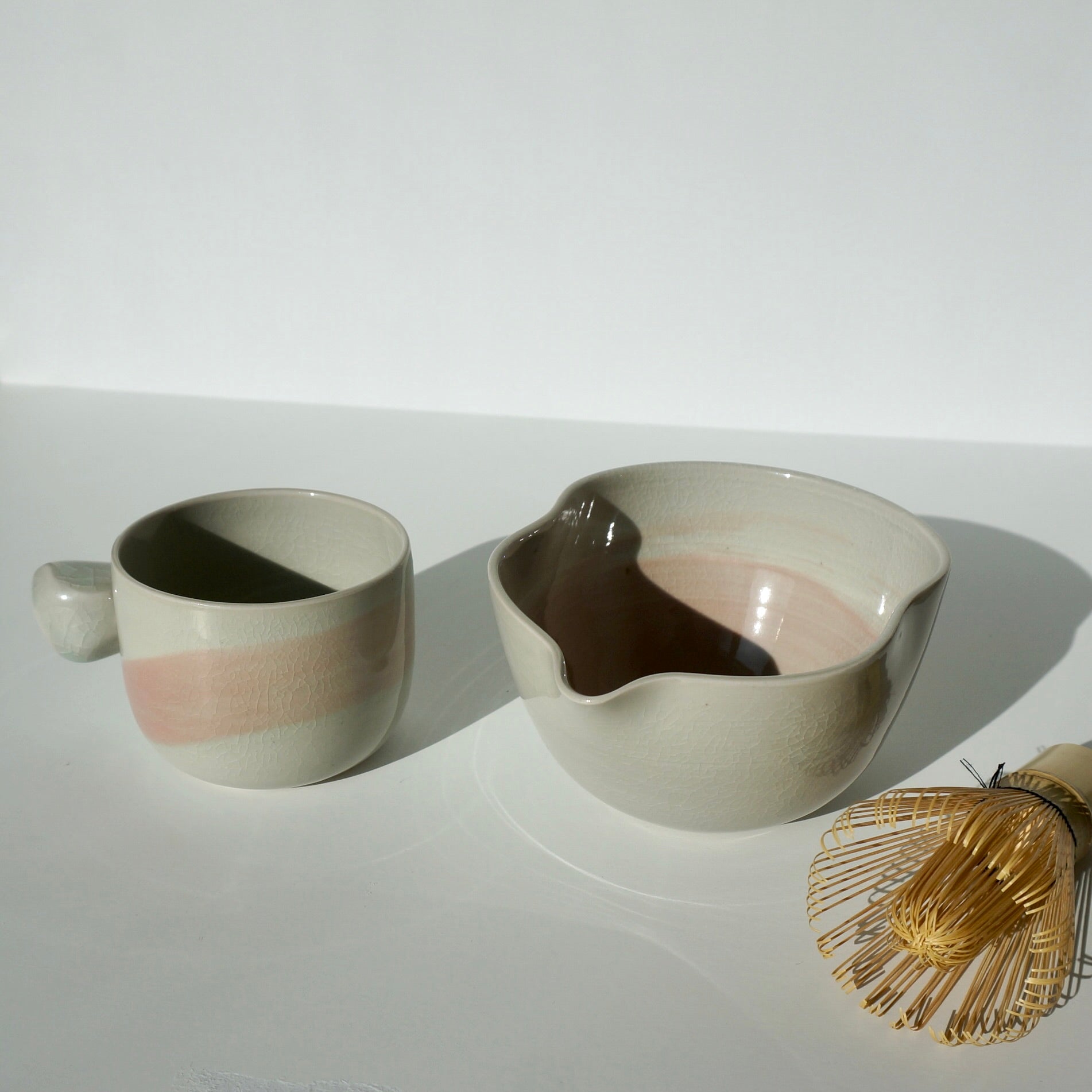 handmade ceramic spouted matcha bowl and mug in blue and pink glaze by Kongji Pottery