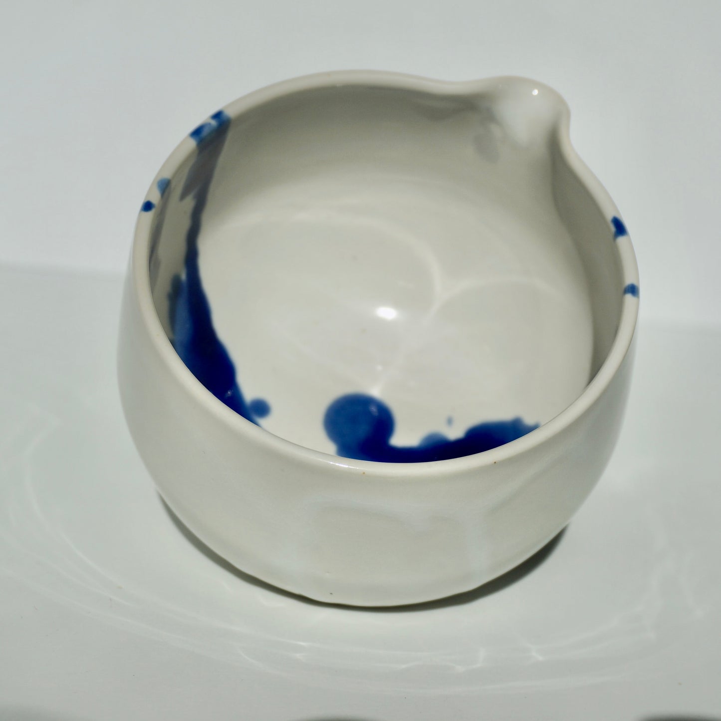 handmade ceramic spouted matcha bowl glossy white with cobalt blue by Kongji Pottery