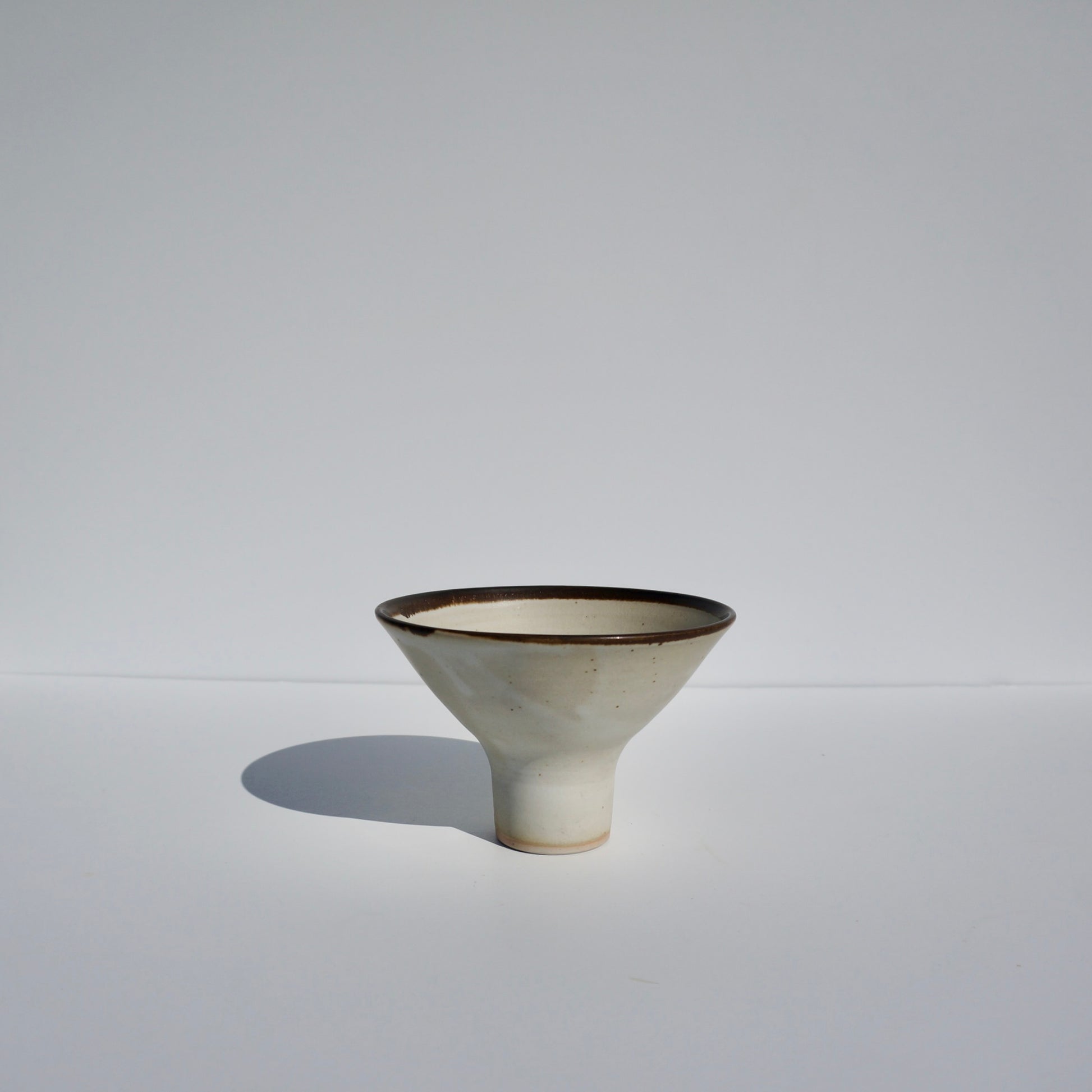 handmade ceramic pedestal flared bowl by Kongji Pottery