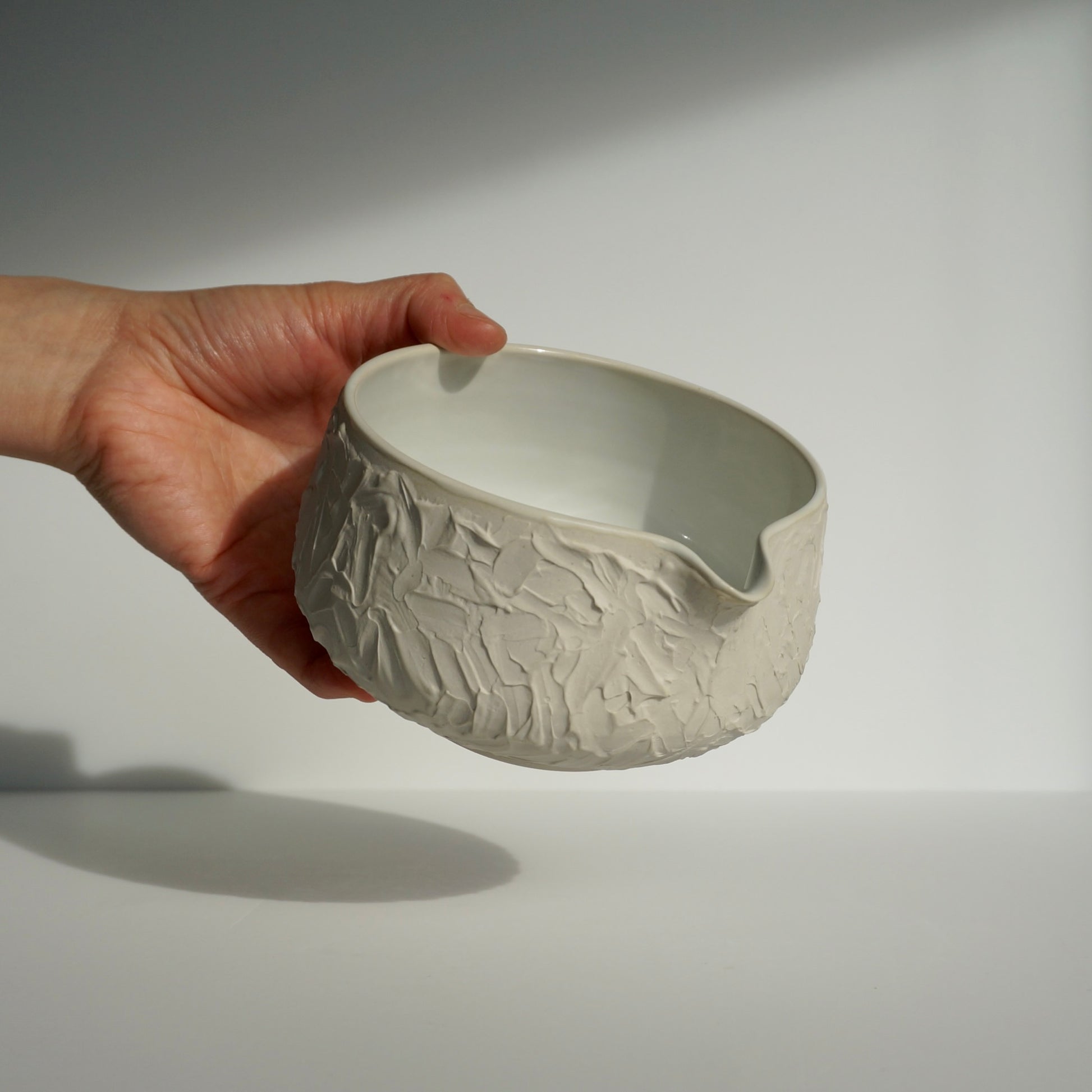 handmade ceramic textured white matcha bowl by Kongji Pottery