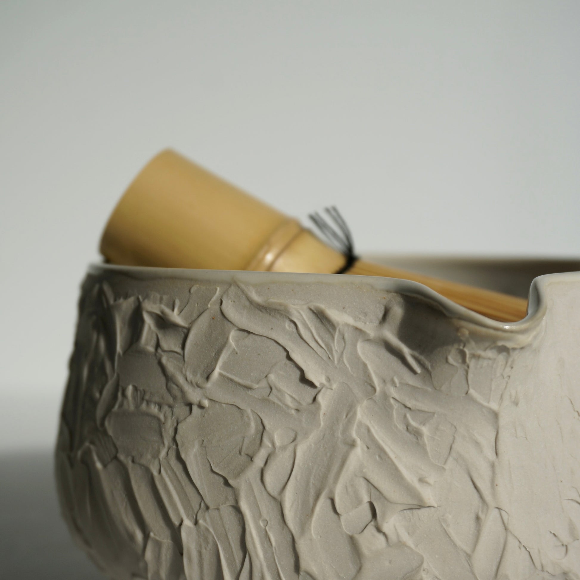 handmade ceramic textured white matcha bowl by Kongji Pottery