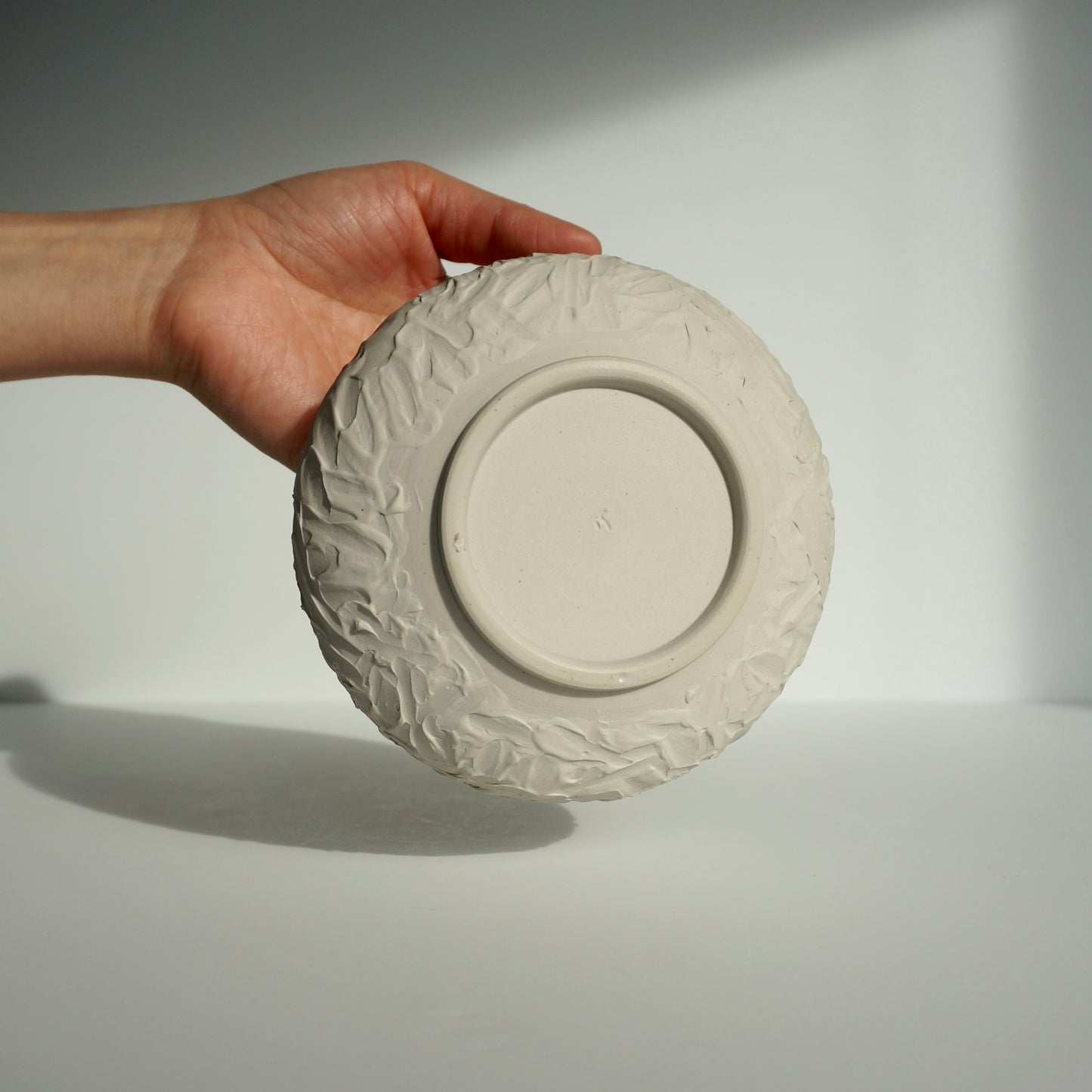 handmade ceramic textured white matcha bowl by Kongji Pottery