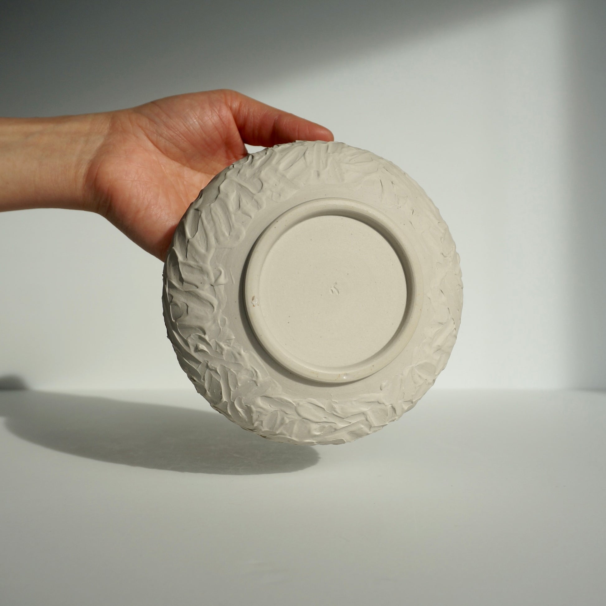 handmade ceramic textured white matcha bowl by Kongji Pottery