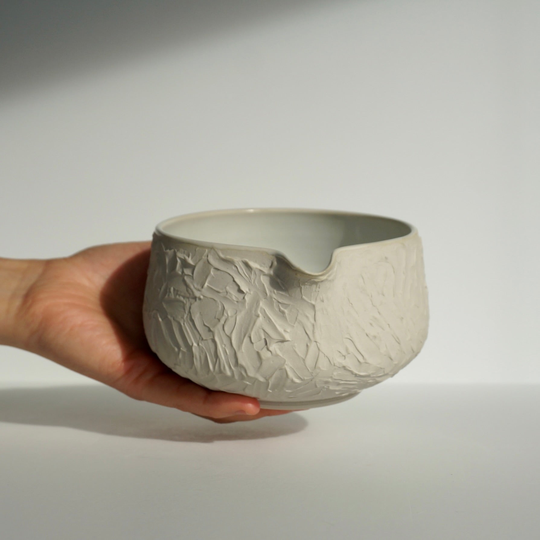 handmade ceramic textured white matcha bowl by Kongji Pottery