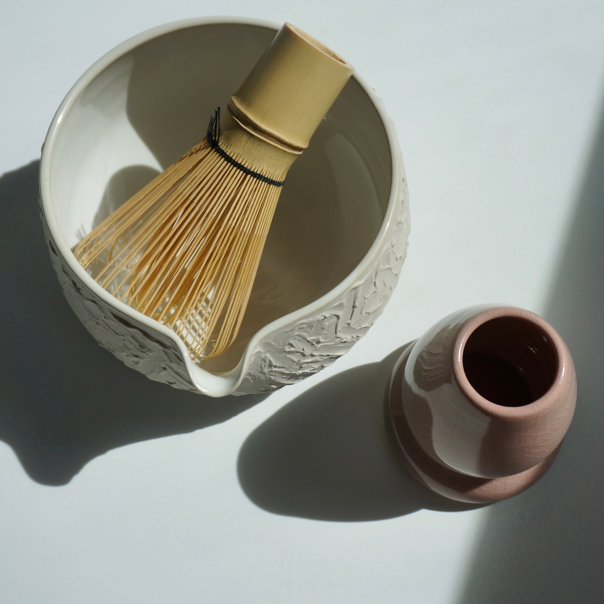 handmade ceramic matcha bowl set in white and pink by Kongji Pottery