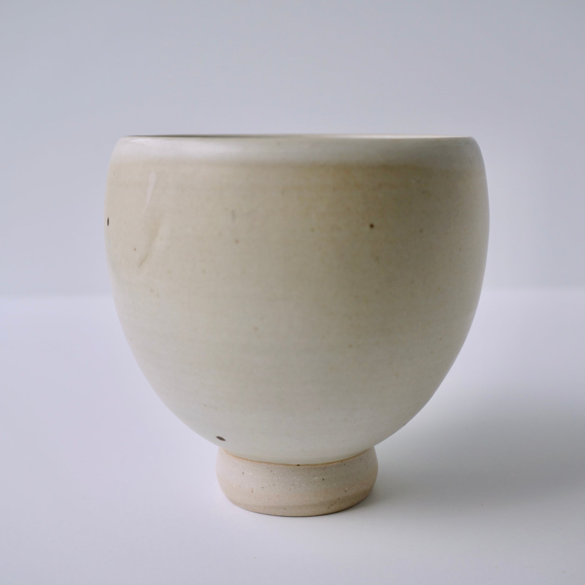 Handmade ceramic oval white bowl with high foot by Kongji Pottery